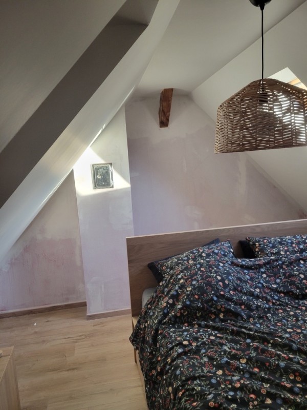 Pose de parquet stratifié à Plobsheim avec fourniture dans chambre sous comble